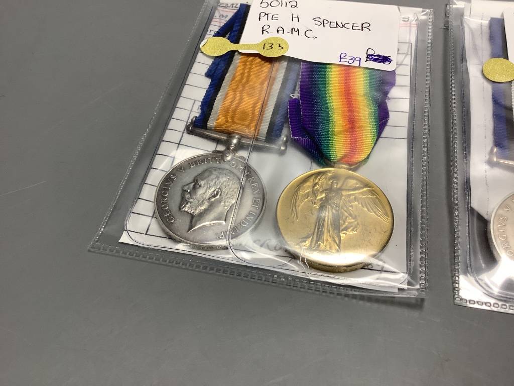 A collection of WW1 medal pairs